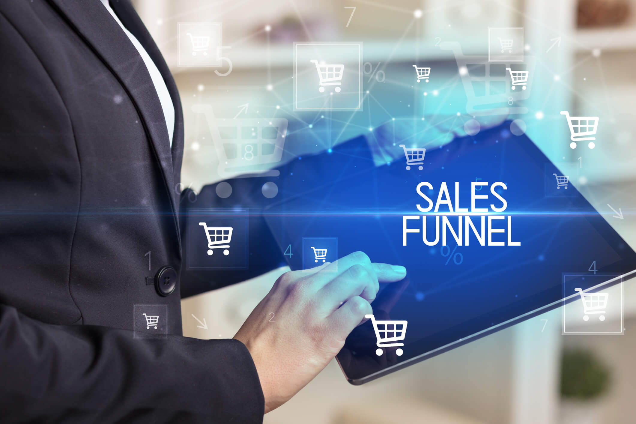 Using a tablet to analyse the sales funnel for an ecommerce store
